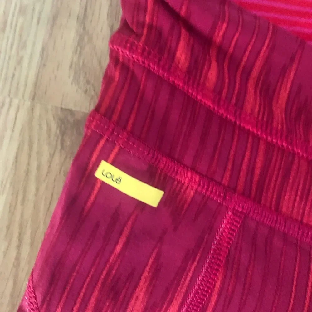 LOLE Pink Mesh Back Zipped Pocket Capri Leggings